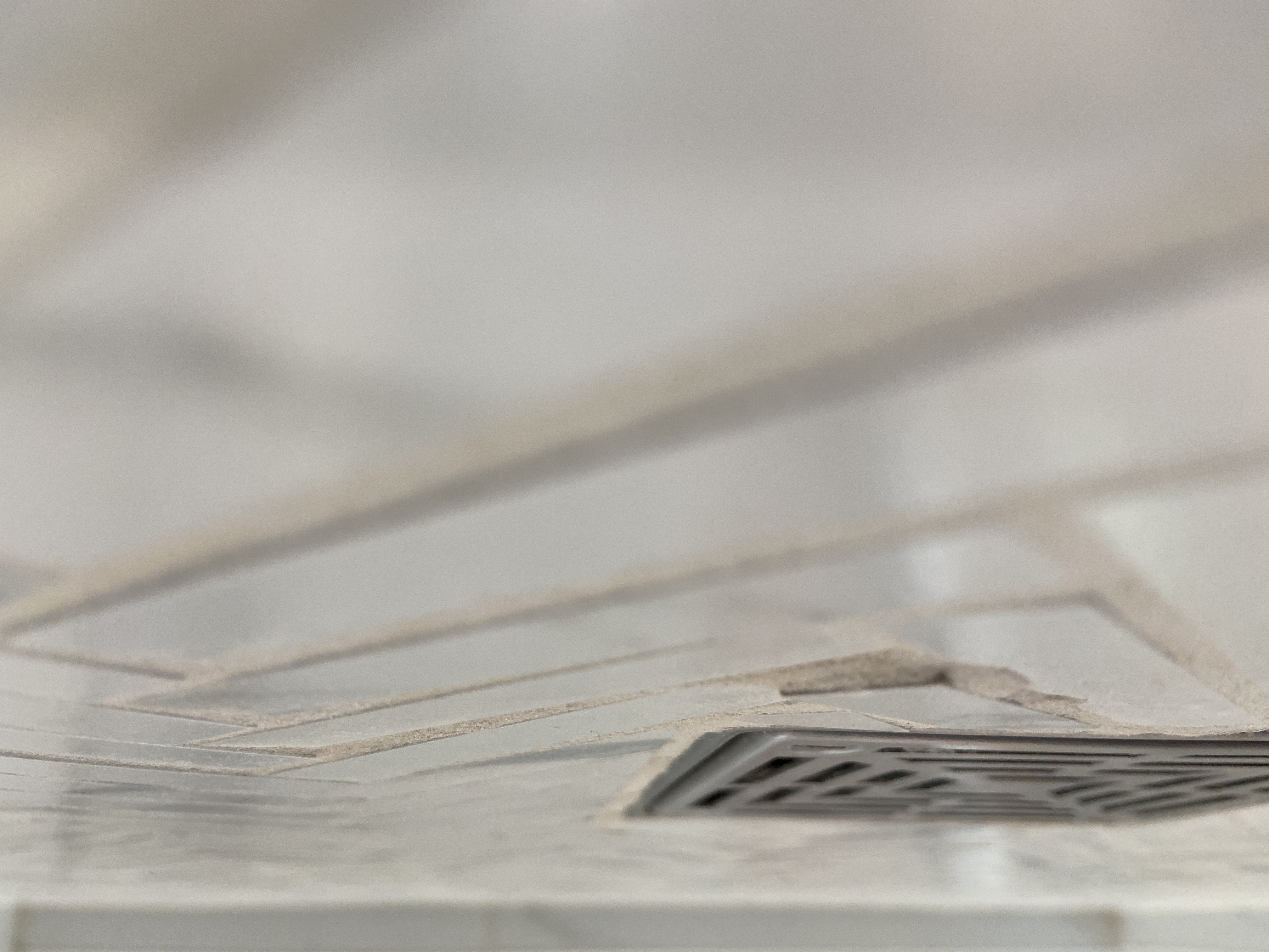 Sheetrock and glue/ bathroom tile Flooring Inspectors